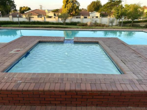 2BR Sandton Comfort, Balcony & Pool